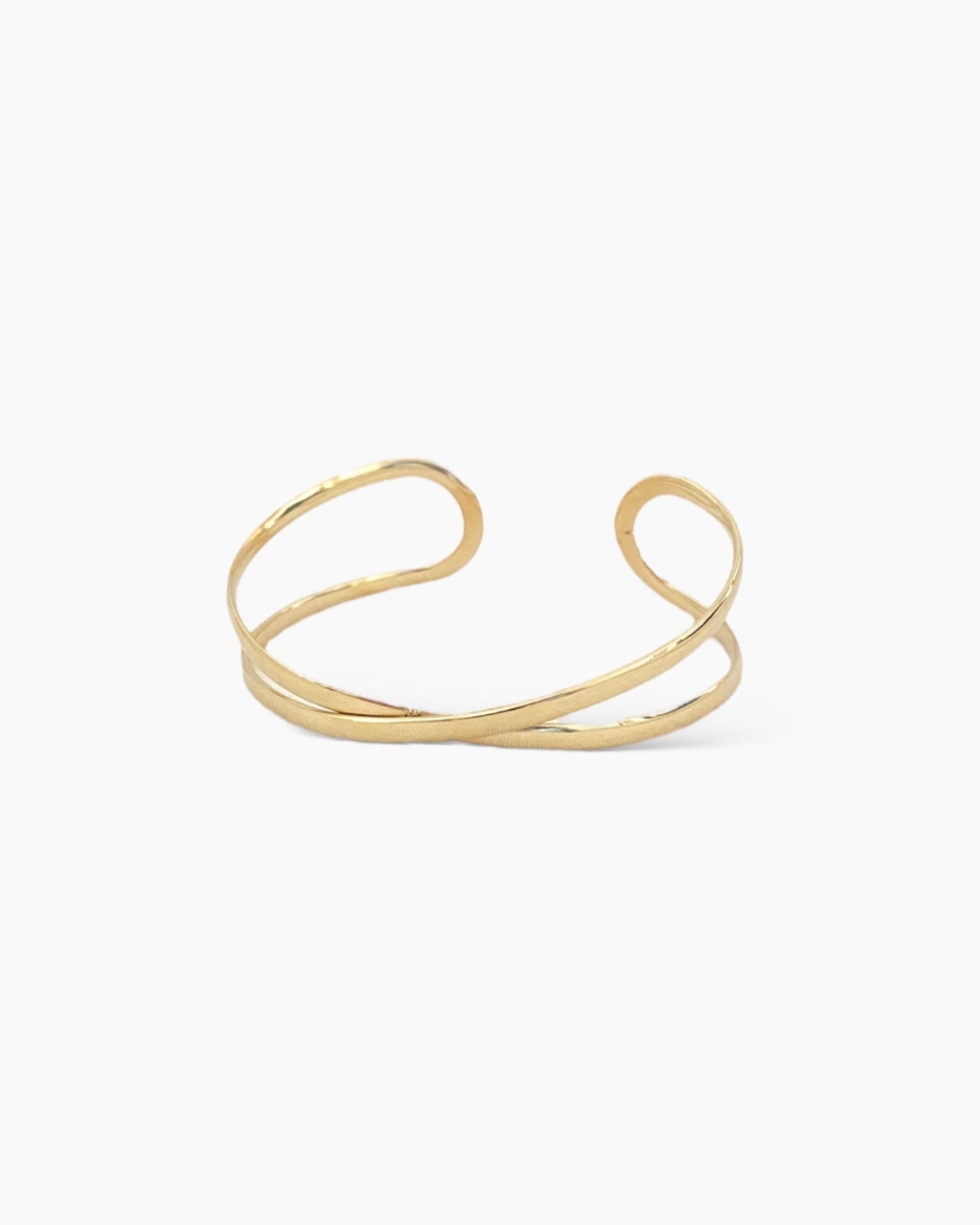 Brazalete ajustable dos bandas cruzadas acero baño oro 18K Exes