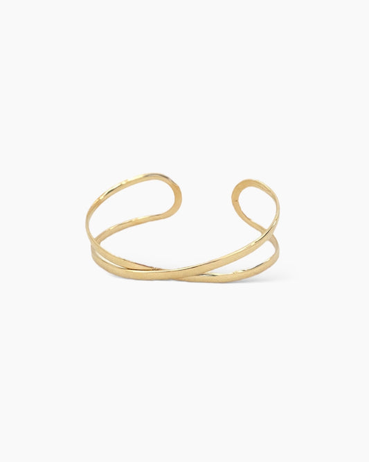 Brazalete ajustable dos bandas cruzadas acero baño oro 18K Exes