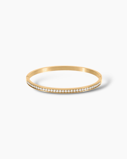 Brazalete de acero con baño de oro 18K circonitas pequeñas The Row