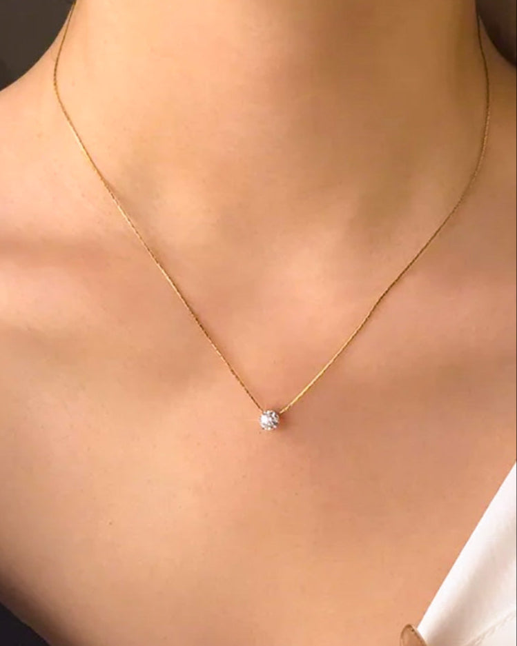 Colgante mini circonita en acero baño oro 18K Solitaro