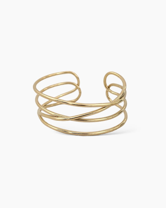 Brazalete ajustable bandas cruzadas en acero inoxidable baño de oro 18K Lia