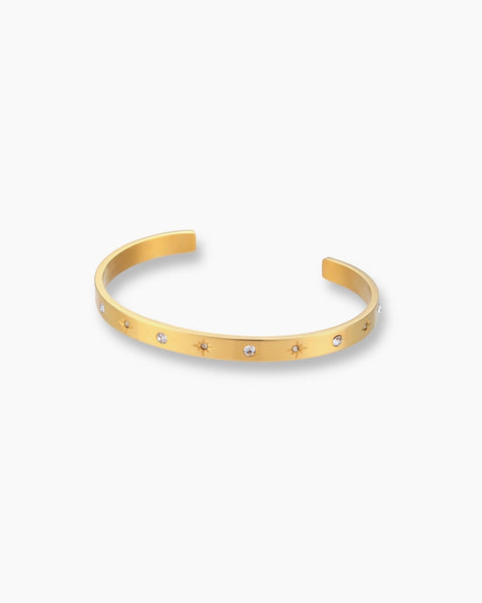 Pulsera brazalete ajustable circonitas en acero inoxidable con baño de oro 18K
