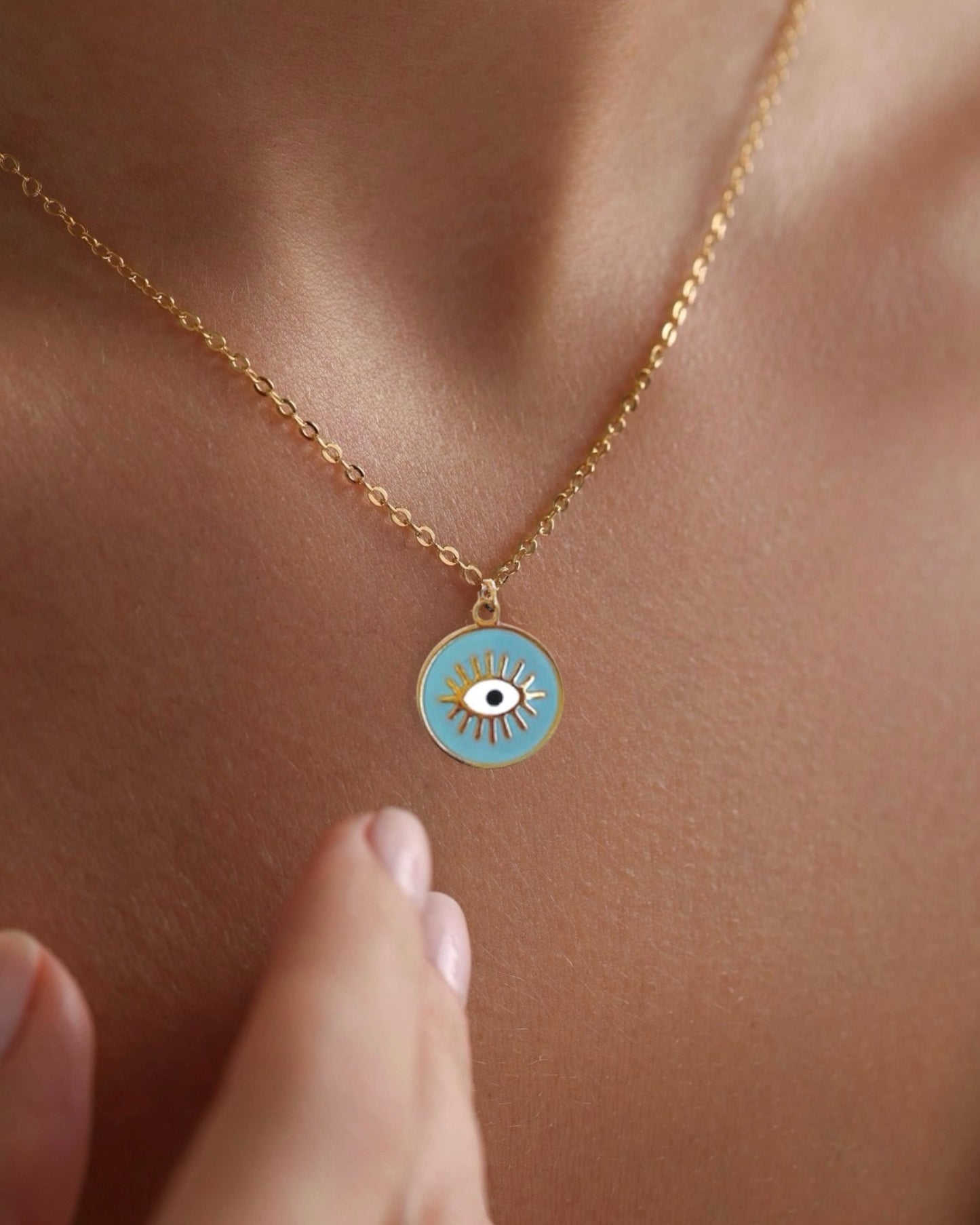 Collar cadena colgante turquesa diseño ojo en acero acabado oro Shield