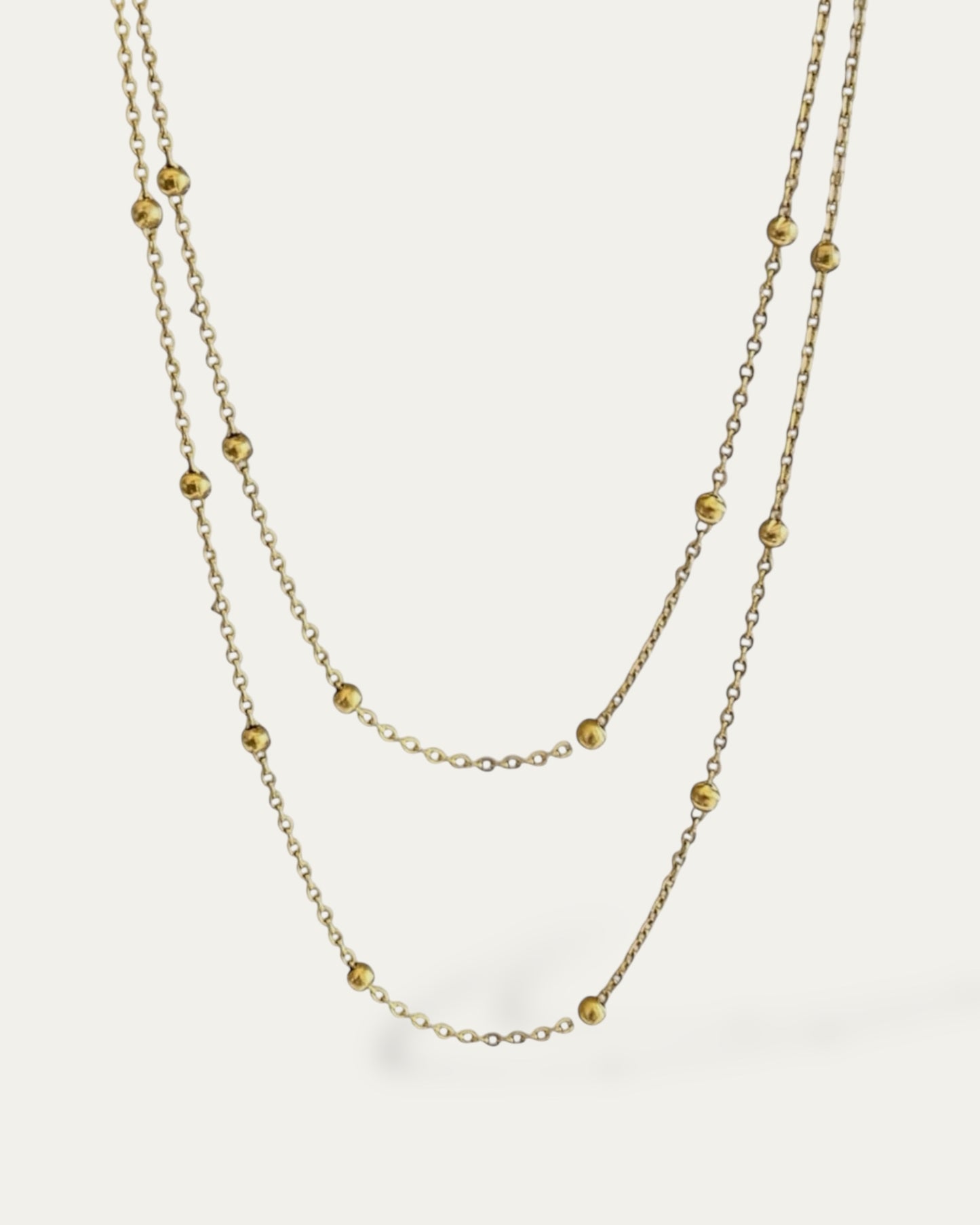 Collar doble largo de cadena fina con bolitas acabado oro 18K Multiposición Bolitas