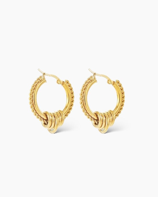 Aros dorados estilo boho en acero baño oro 18K Hindi