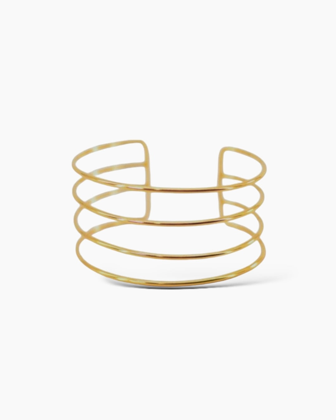 Brazalete ajustable bandas en acero inoxidable con baño de oro 18K  Quatro