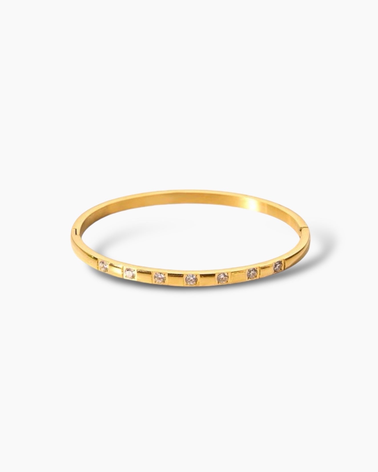 Brazalete de acero con baño de oro 18k circonitas grandes Weekend