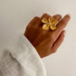 Anillo flor ajustable con circonita en acero baño oro 18K June