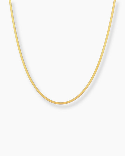 Cadena plana 3mm en acero baño oro 18K Lisa