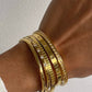 Brazalete de acero con baño de oro 18k circonitas grandes Weekend