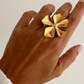 Anillo flor ajustable con circonita en acero baño oro 18K June