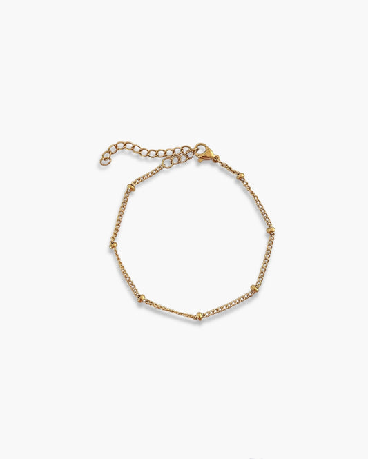 Pulsera cadena bolitas en acero baño oro 18K Puntos