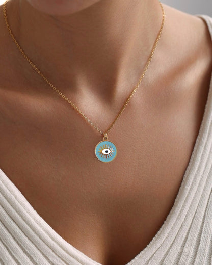 Collar cadena colgante turquesa diseño ojo en acero acabado oro Shield