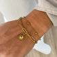 Pulsera doble cadena charm sin en acero baño oro 18K Doble sol