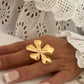 Anillo flor ajustable con circonita en acero baño oro 18K June