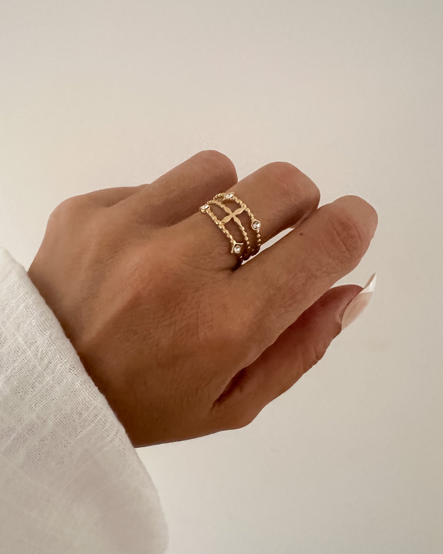 Anillo finto tres bandas con circonitas en acero oro 18K Lis Circonita