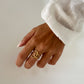 Anillo entrelazado ajustable en acero baño oro 18K Whimsy