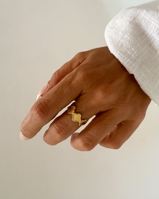 Anillo ajustable diseño tréboles en acero baño oro 18K Clover