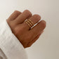 Anillo fino triple ajustable en acero acabado oro 18K Spina