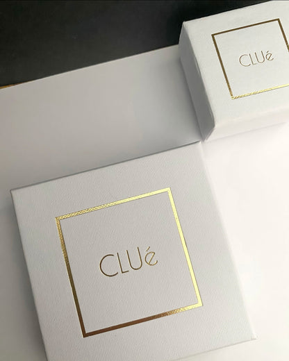 Pendientes de aro pequeños con charm de ojo en acero baño oro 18K Mini Ojos