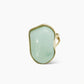 Anillo con piedra color aqua de acero inoxidable bañado en oro 18k. Ajustable