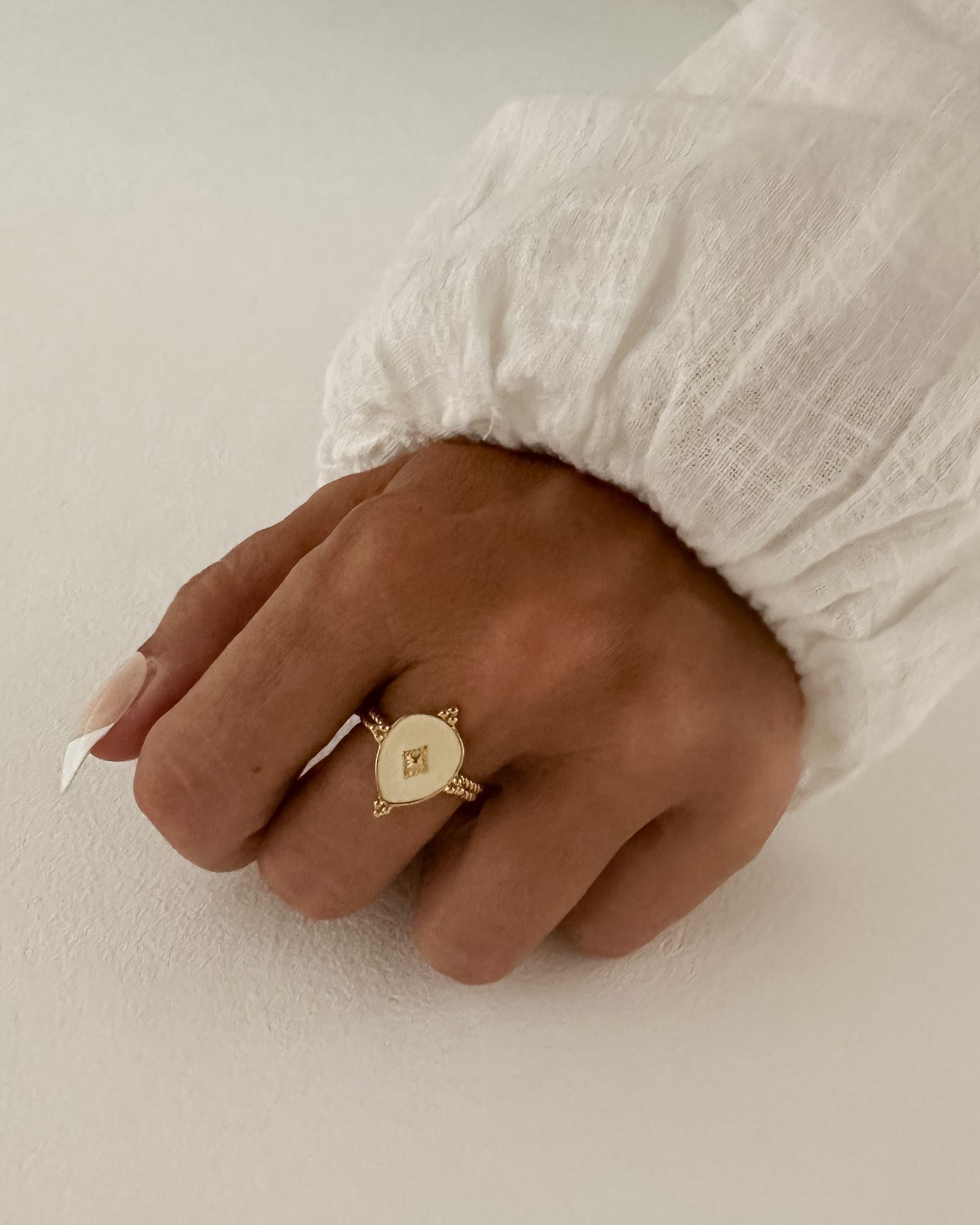 anillo sello blanco