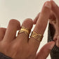 Anillo ajustable bandas cruzadas en acero inoxidable baño oro 18K Marea