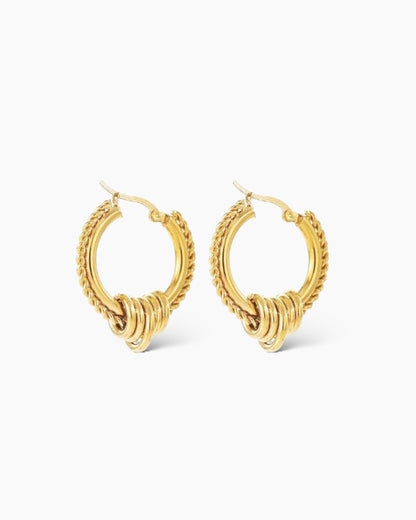 Aros dorados estilo boho en acero baño oro 18K Hindi