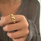 Anillo rizado espiral en acero inoxidable baño oro 18K Twist