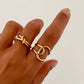 Anillo entrelazado ajustable en acero baño oro 18K Whimsy