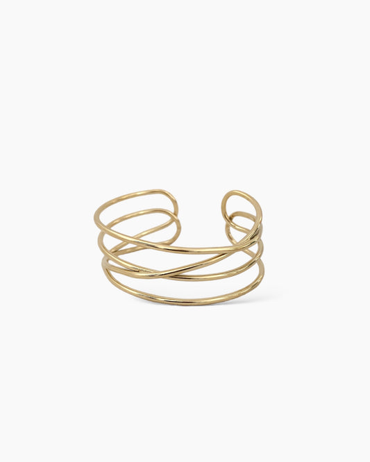 Brazalete ajustable bandas cruzadas en acero inoxidable baño de oro 18K Lia