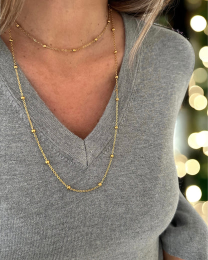 Collar doble largo de cadena fina con bolitas acabado oro  18K Multiposición Bolitas