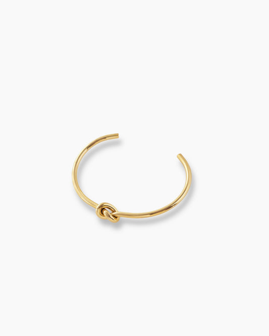 Pulsera brazalete nudo en acero baño de oro 18K Knot